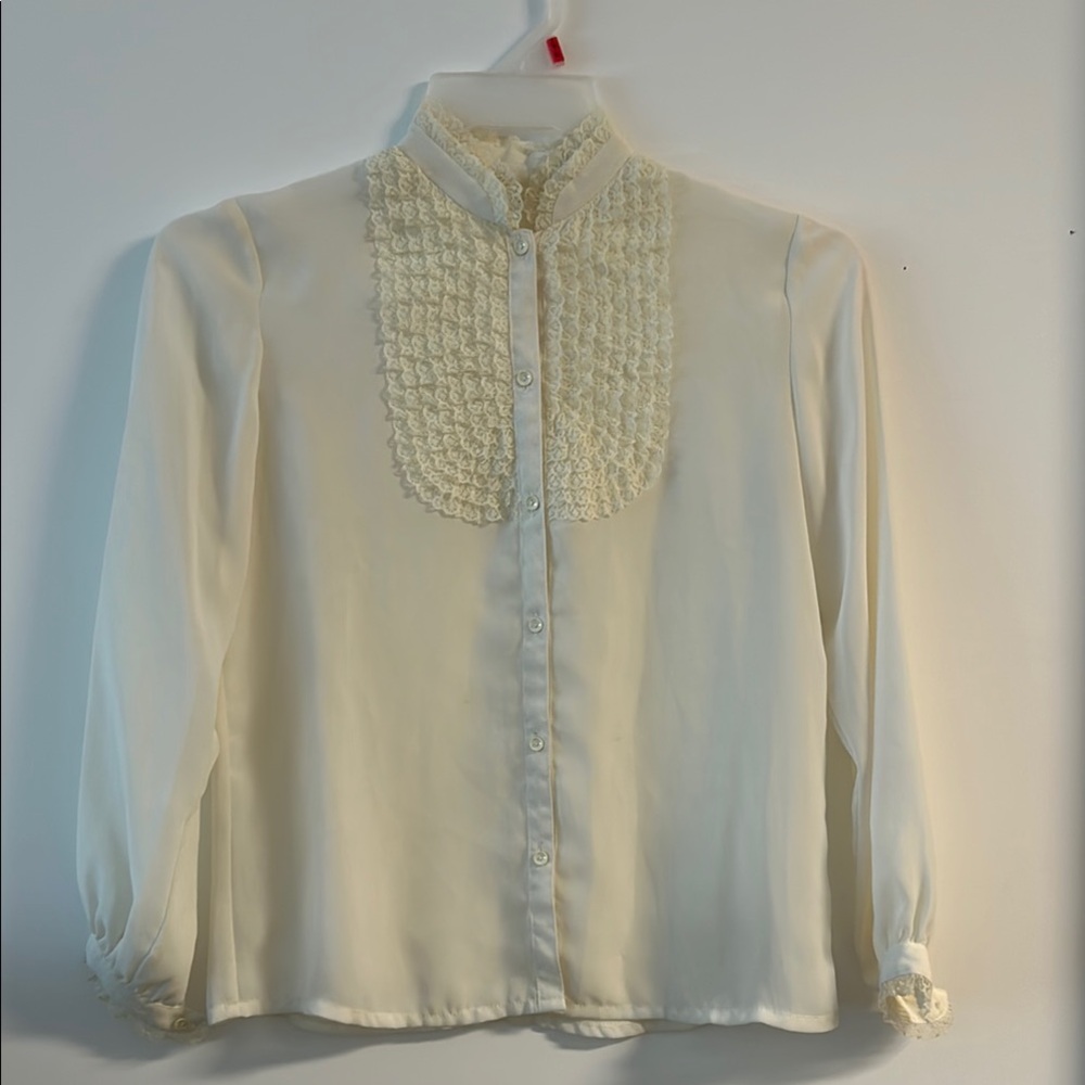 Beautiful off white blouse with chest embellishments no tag size small